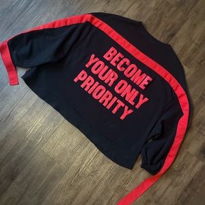 Zara black/red sweatshirt with graphic quote print.